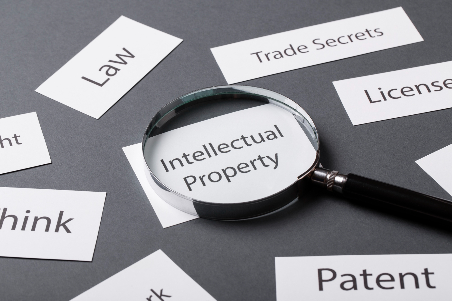 A magnifying glass highlighting intellectual property