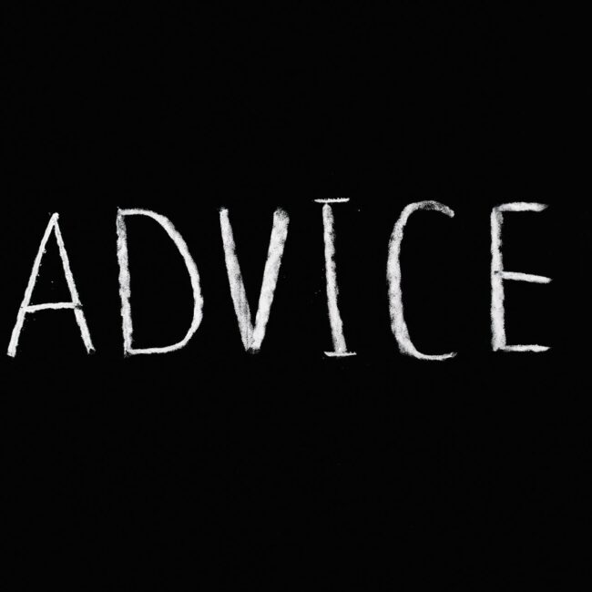 Word advice written on a black board